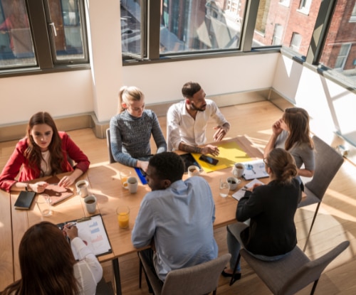 Team meeting at conference table.