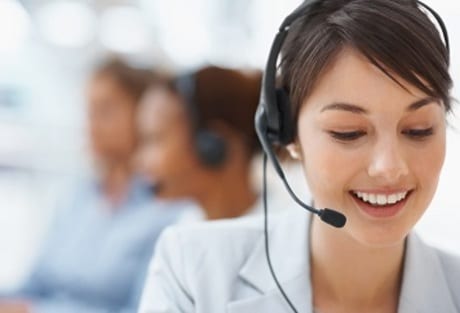 Female customer experience coordinator wearing a headset, Are your team members providing the customer a positive experience every time?