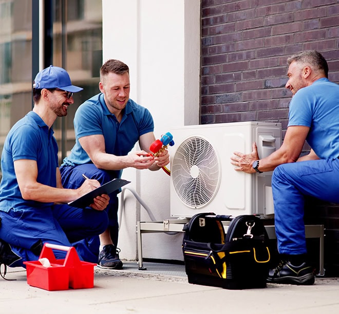 HVAC Maintenance being performed by technicians.
