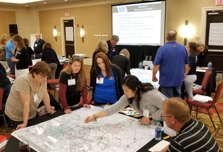 People Looking at a Map